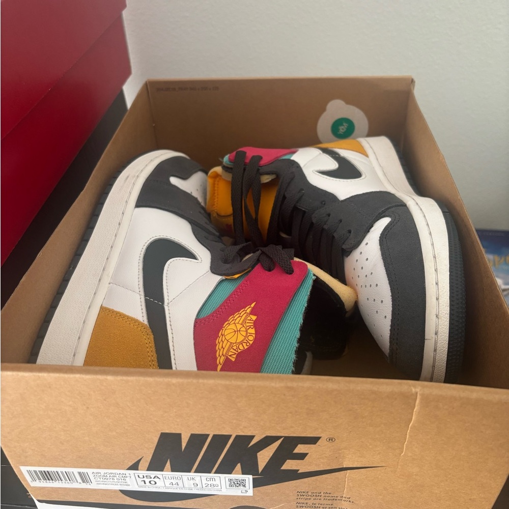 Nike Air Jordan Sneakers with Black, White, Yellow, Teal, and Red